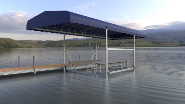 Boat Lift Canopies with a blue cover beside a wooden dock on a calm lake, hills and cloudy sky in the background.